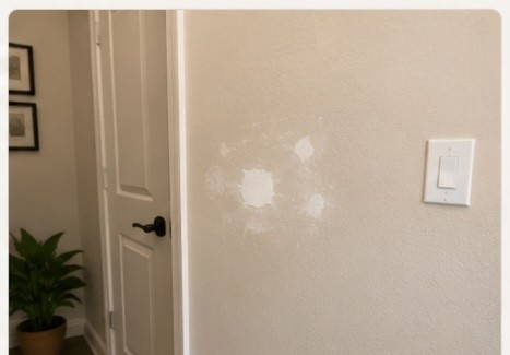 Freshly patched and painted interior wall